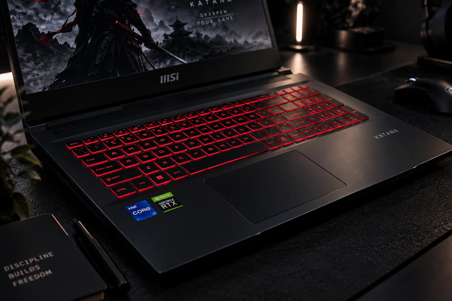 Close-up of the MSI Katana GF76 keyboard with red backlighting